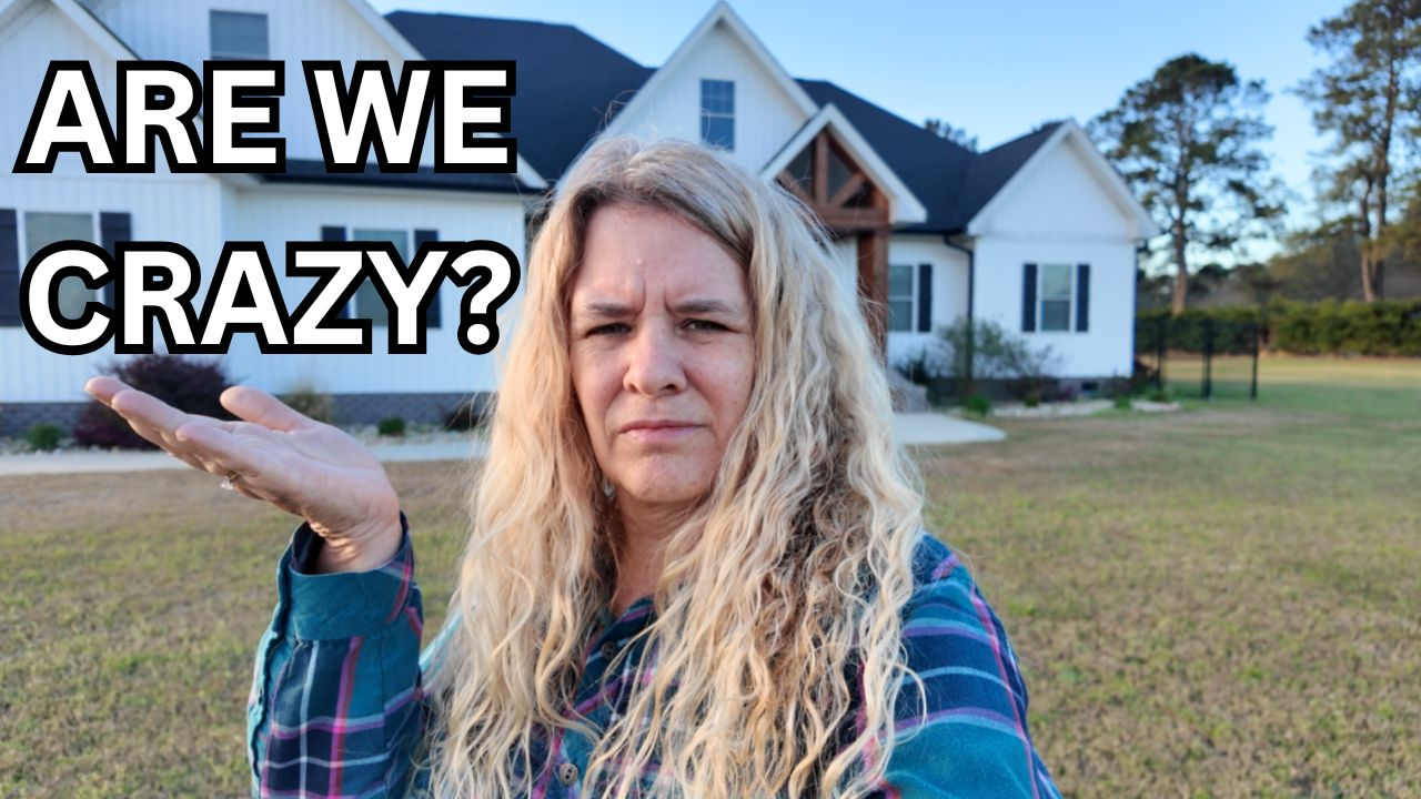 Lisa Walker standing in front of her custom home and Brinkley 4150 RV with text asking Are We Crazy